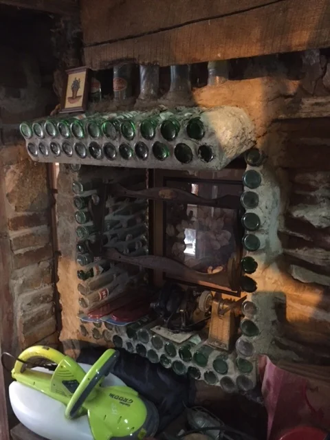 Vintage soda bottles used to make a window.