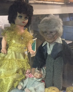 Tonya spotted these totally not creepy dolls in a dust covered case inside the main building.