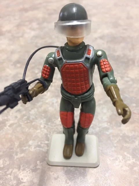the clear visor and futuristic laser gun make flash a striking action figure.