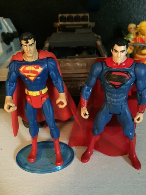 Superman side by side with a newer Superman: Man of Steel figure which is terrible. I do wish i could swap out the hands but that is absolutely the only thing better about the more recent superman figures.