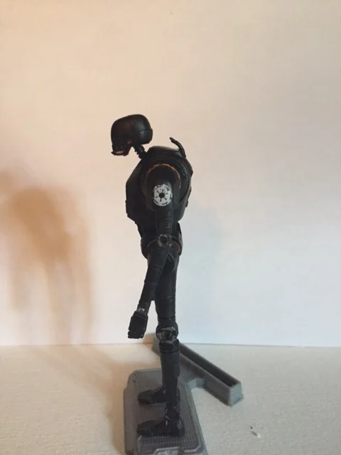 the slumping posture and forward sitting head only adds to this figures impressiveness. also, notice the imperial markings on the arm.