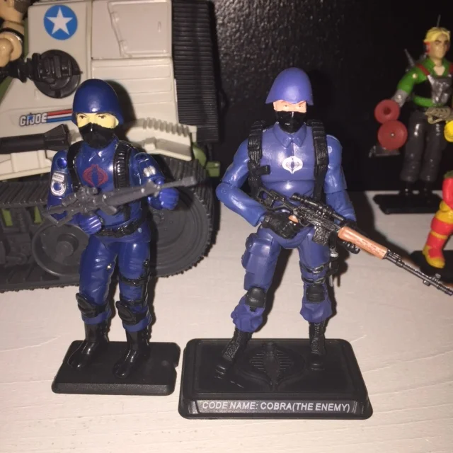 Here is the original (well, 1983) Cobra Trooper along side the 25th anniversary era dollar general basic trooper which i also think is one of the best of the line. the wood grain details to the modern era troopers gun really sets him off and i actually get my black gloves.