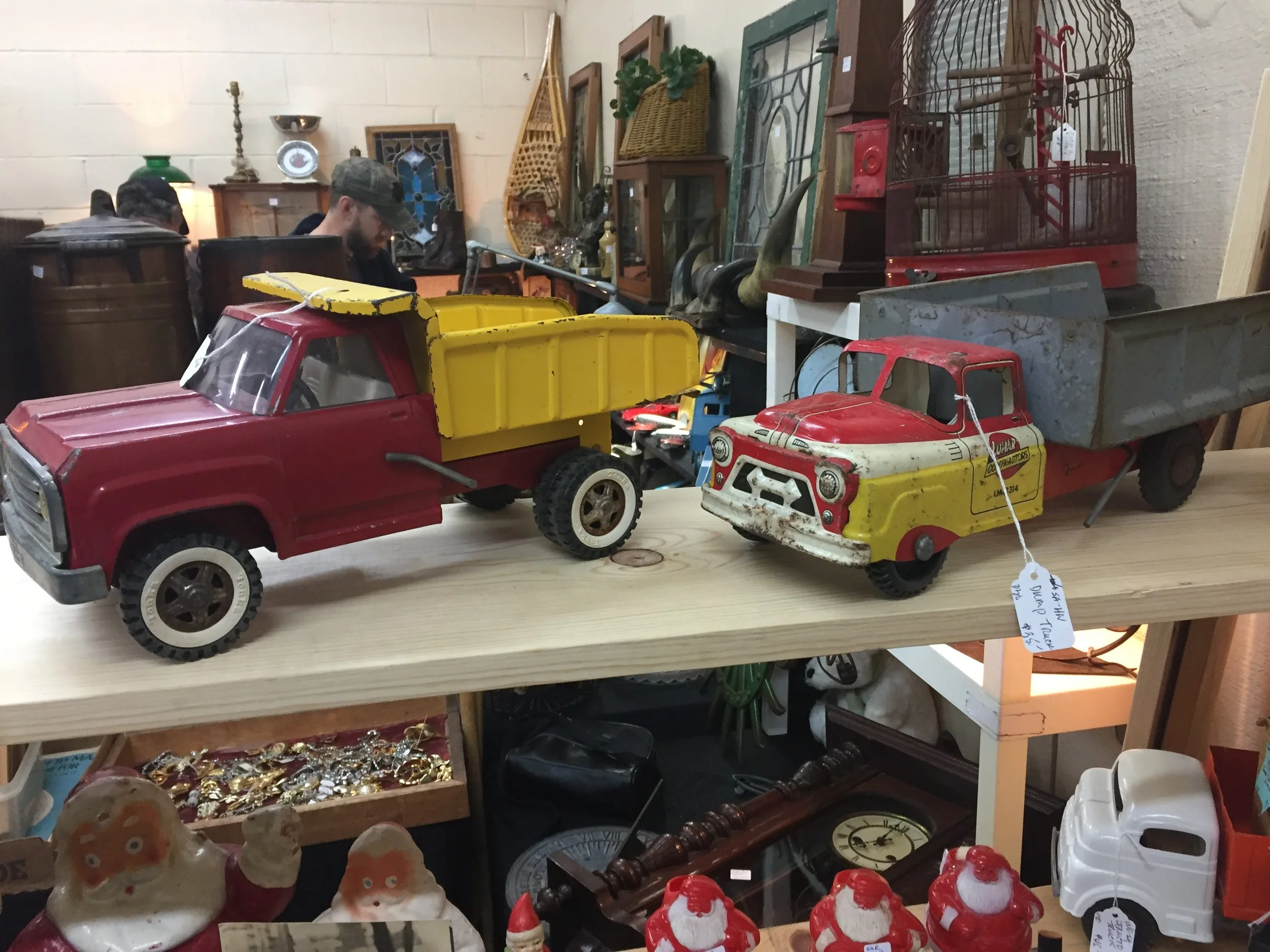 These old toy trucks were at the same booth as the teddy bears. i wish i knew more about these.