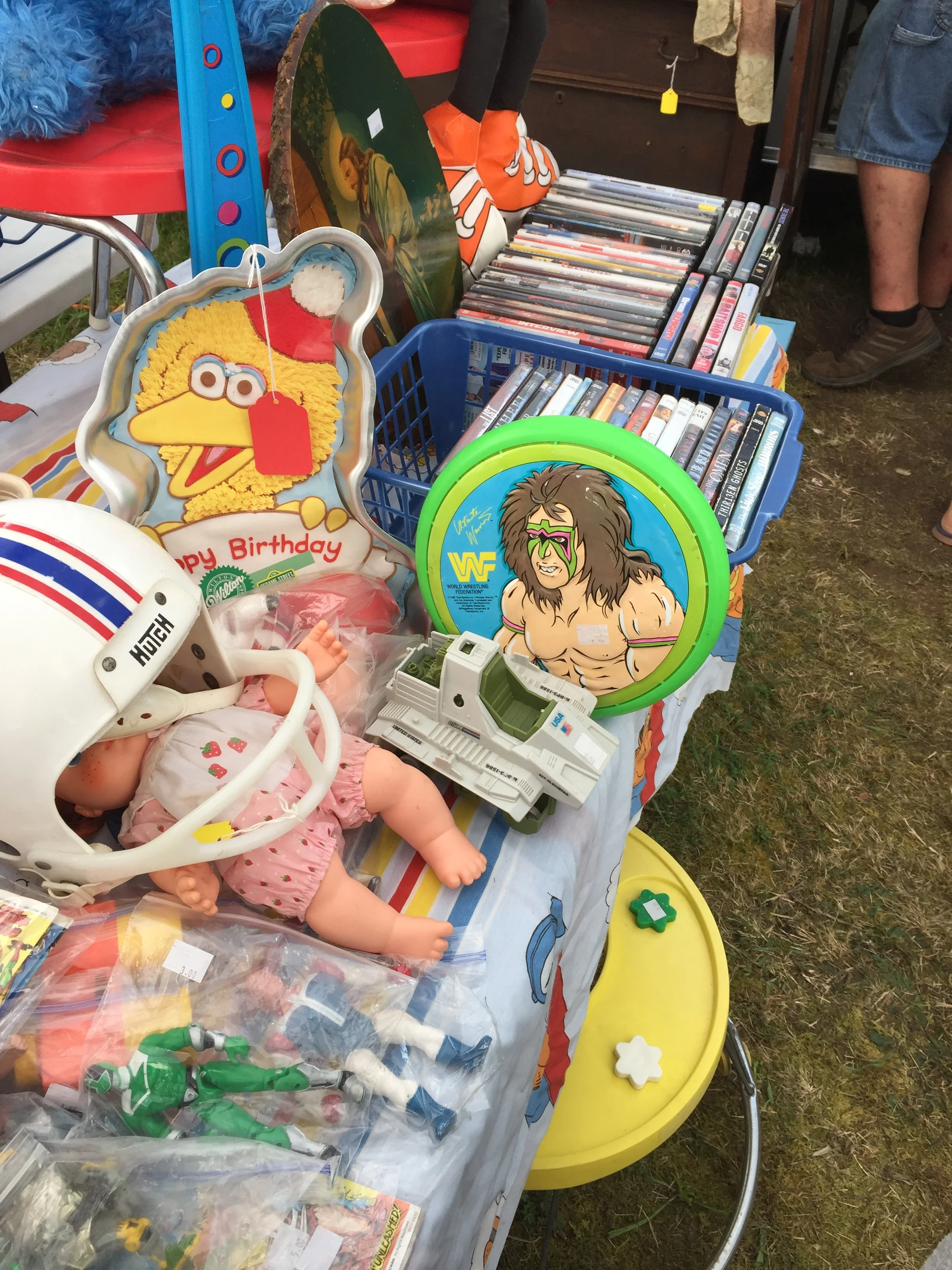 What goodies came you spot? A power Ranger, A plastic football helmet, the remains of a G.I. Joe Triple T tank, An ultimate warrior WWF Frisbee, Big Bird, DVDs, and more!