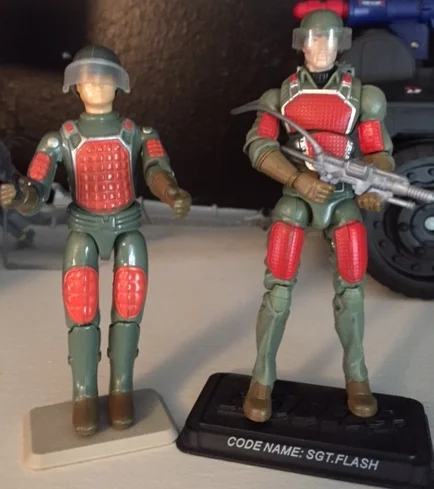 Original 1982 flash along side his 25th anniversary update Sgt. Flash.