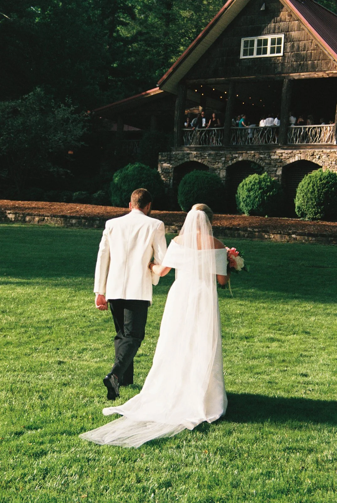 Film Photograph of a wedding ceremony at Camp Greystone in Flat Rock, NC.