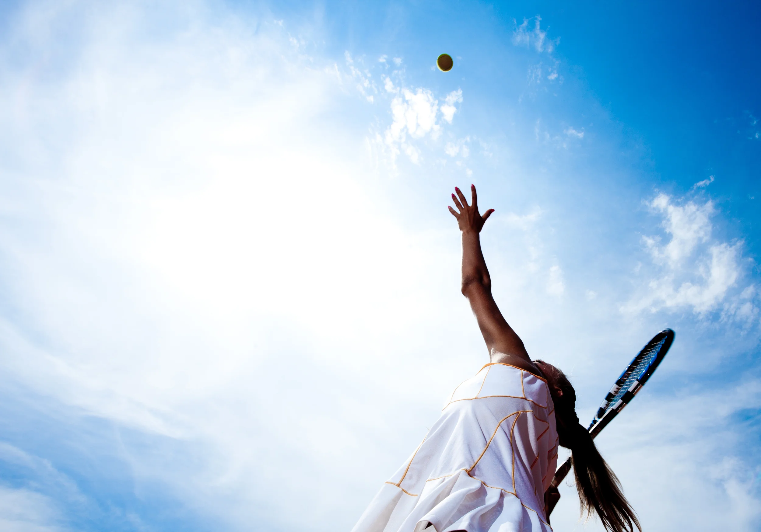 shutterstock - blue sky & girl tennis.jpg