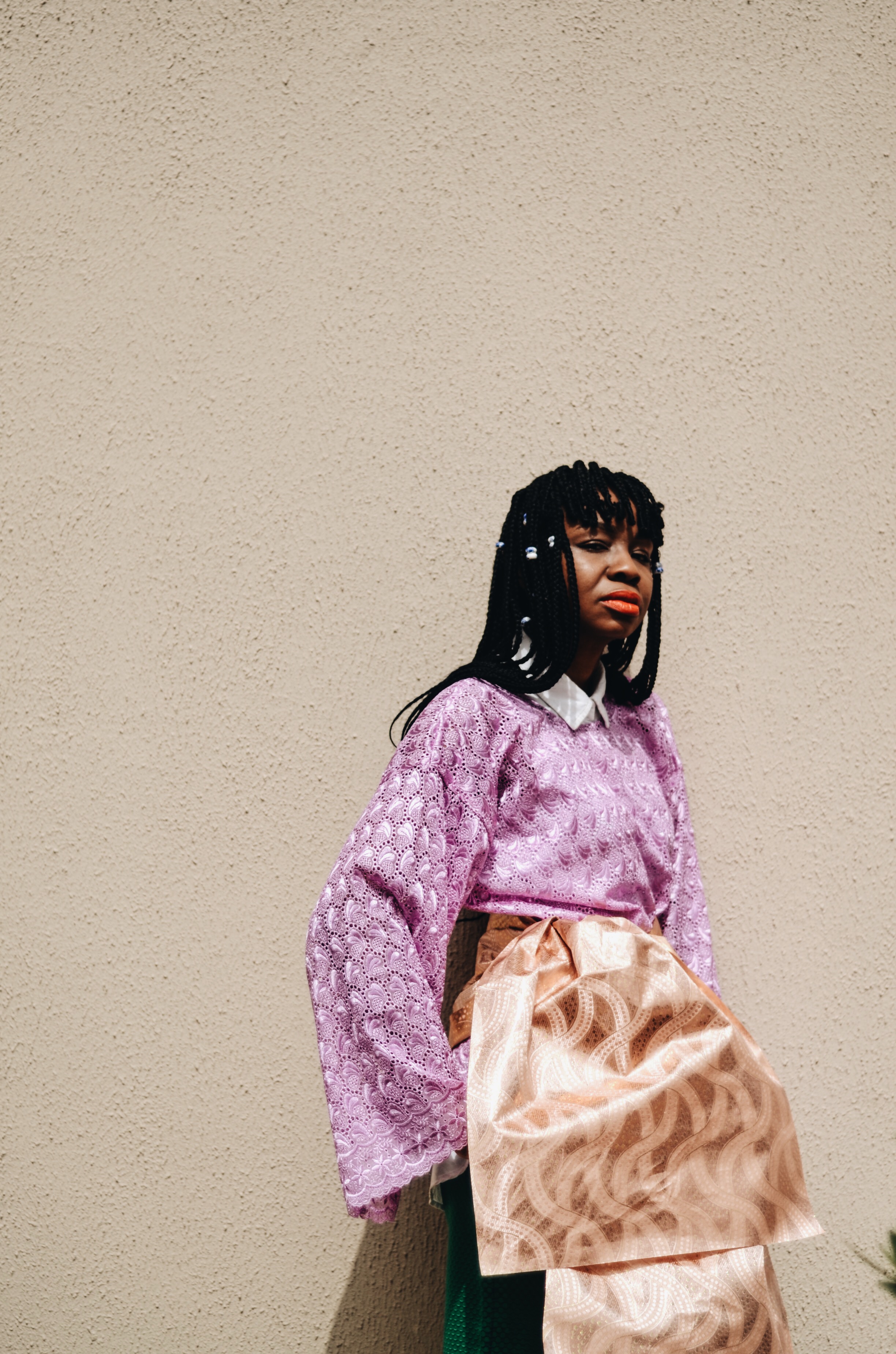 The gold fabric is what we call Gele in Nigeria. It's a head scarf but i tied it on my waist.
