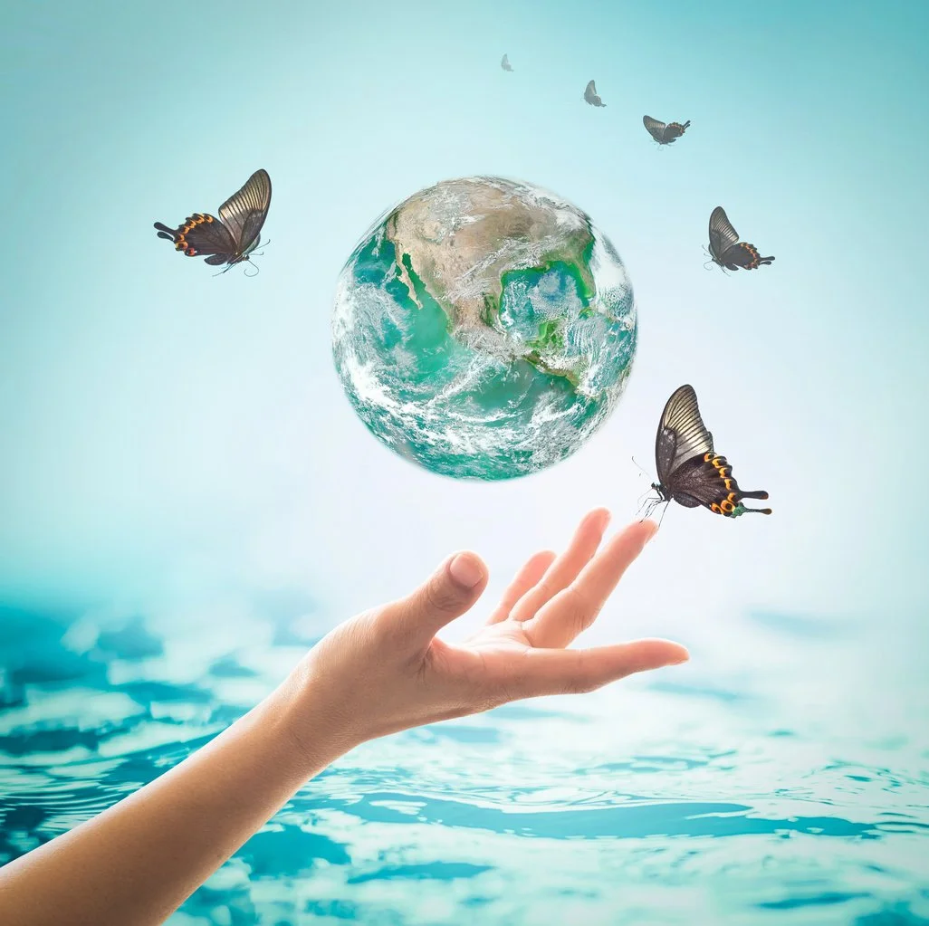 World-ocean-day,,-saving-water-campaign,-sustainable-ecological-ecosystems-concept-with-green-earth-on-woman's-hands-on-blue-sea-background-_-Element-of-this-image-furnished-by-NASA-959387248_1028x1025.jpeg