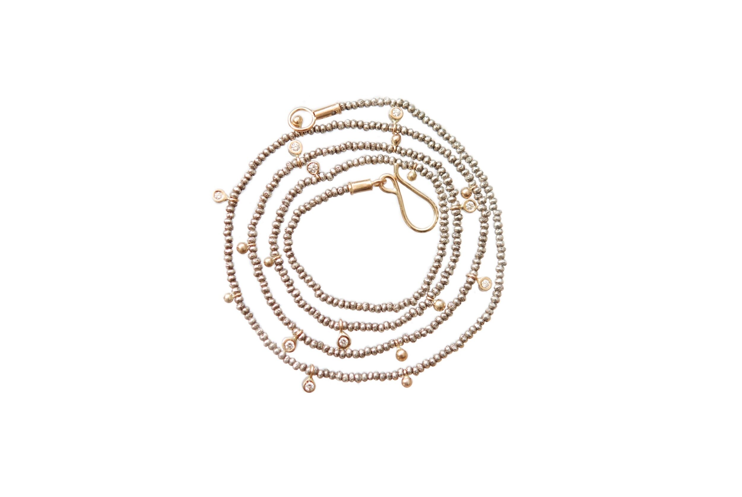Necklace 255 9 diamonds1.jpeg