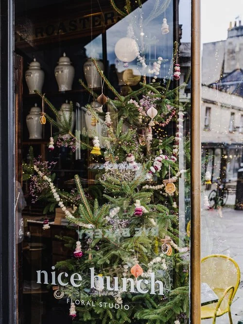 Dried flower baubles on Christmas tree by Nice Bunch