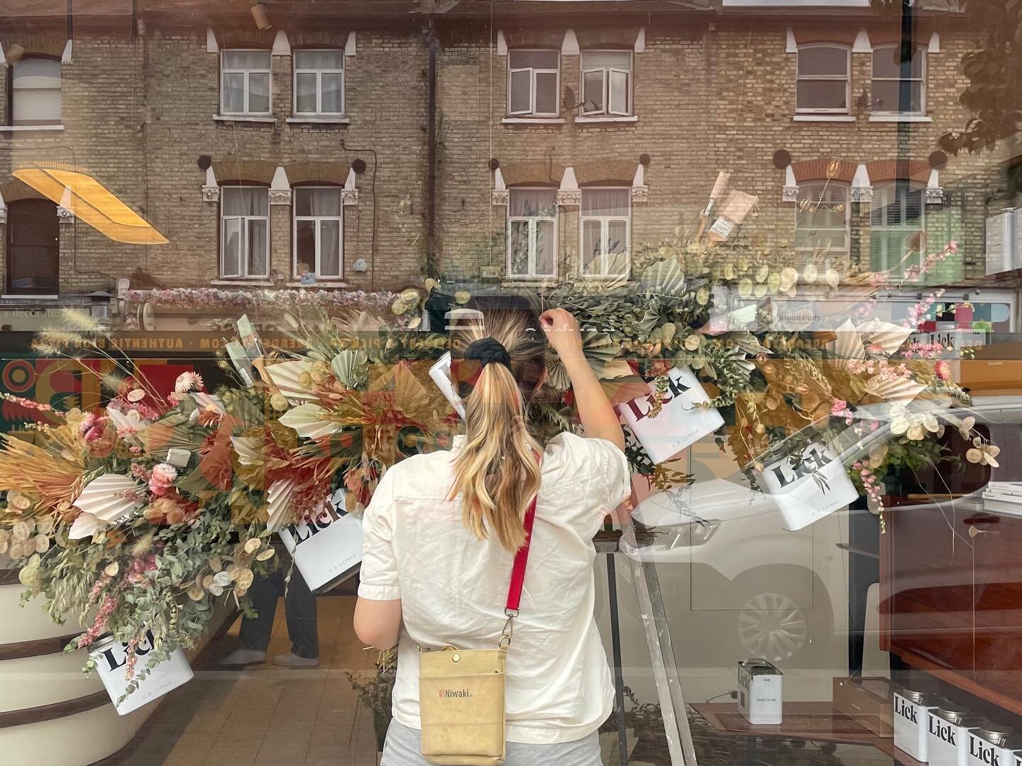 Loved working with the team at ethical paint company @lick to create this installation for the opening of their first store on Northcote road,  Battersea. Our flower cloud includes their distinctive paint tins, used brushes and colour samples folded 