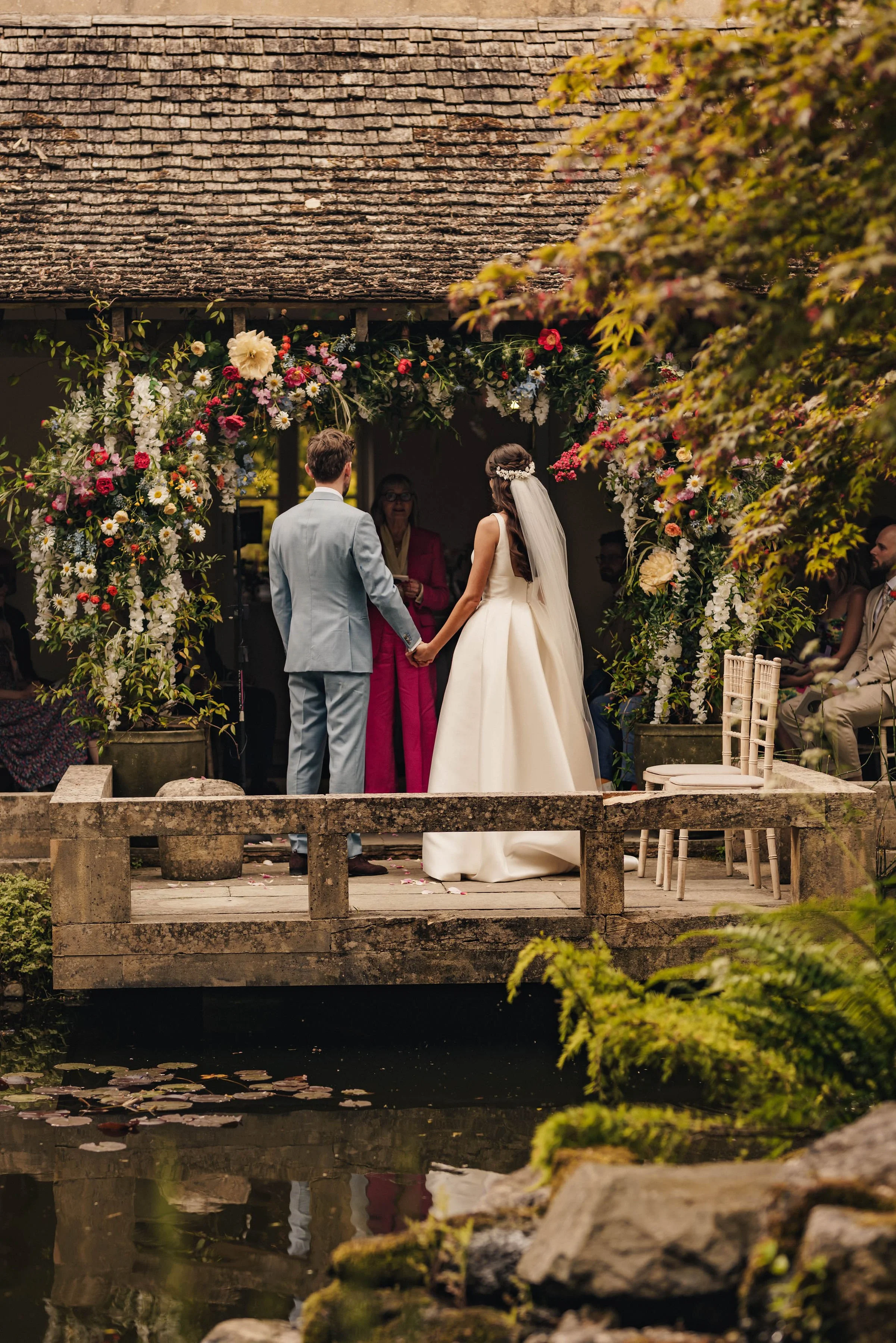 Nice Bunch Ethical Floral Studio and Farm Sula and Oliver Jones The Matara Centre Cloistered Courtyard Floral Arch Wedding Shot by We Are The Chamberlains Photography