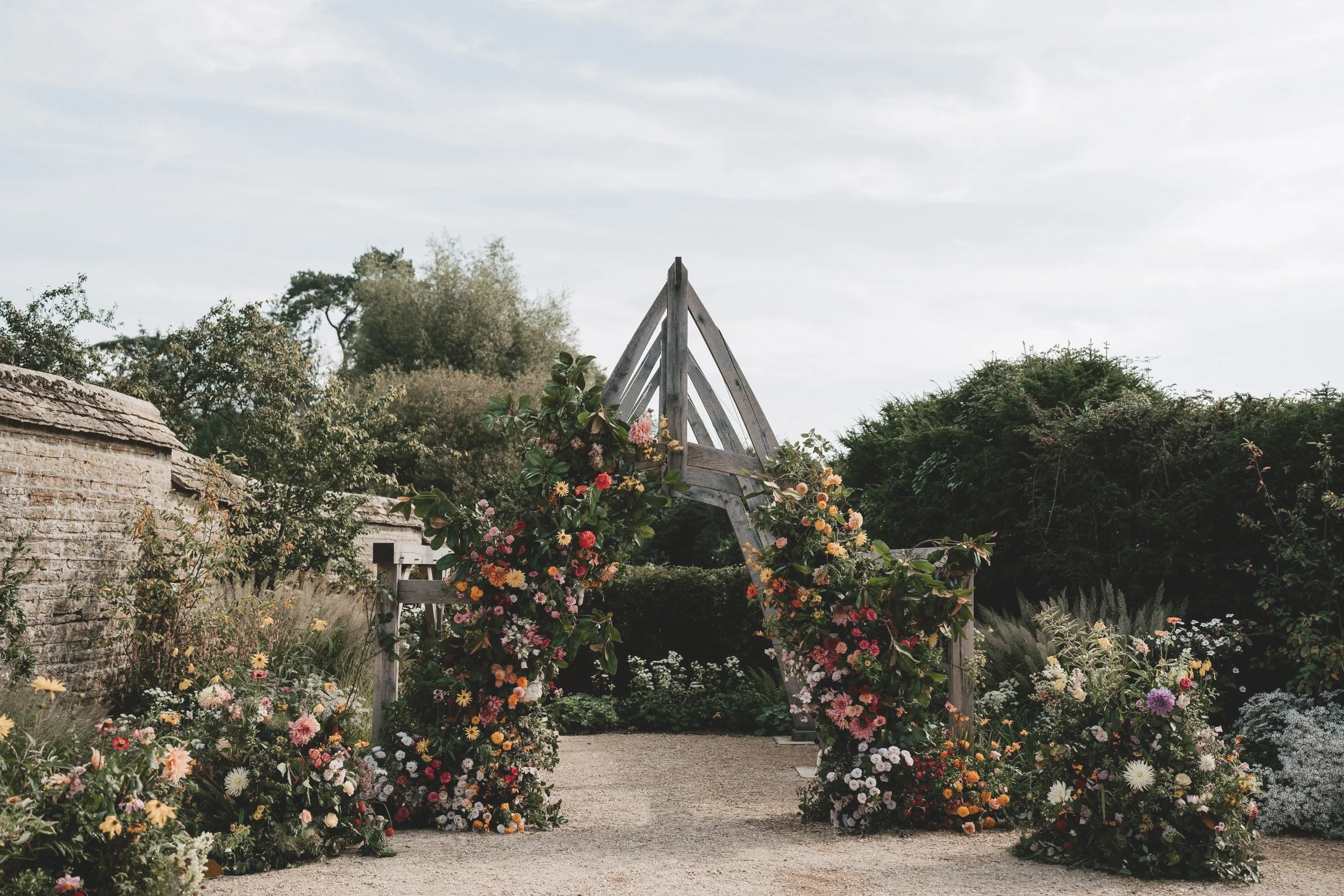 Nice Bunch Ethical Floral Studio and Farm Sula and Oliver Jones Kin House Chippenham Floral Arch Wedding Shot by We Are The James's Photography