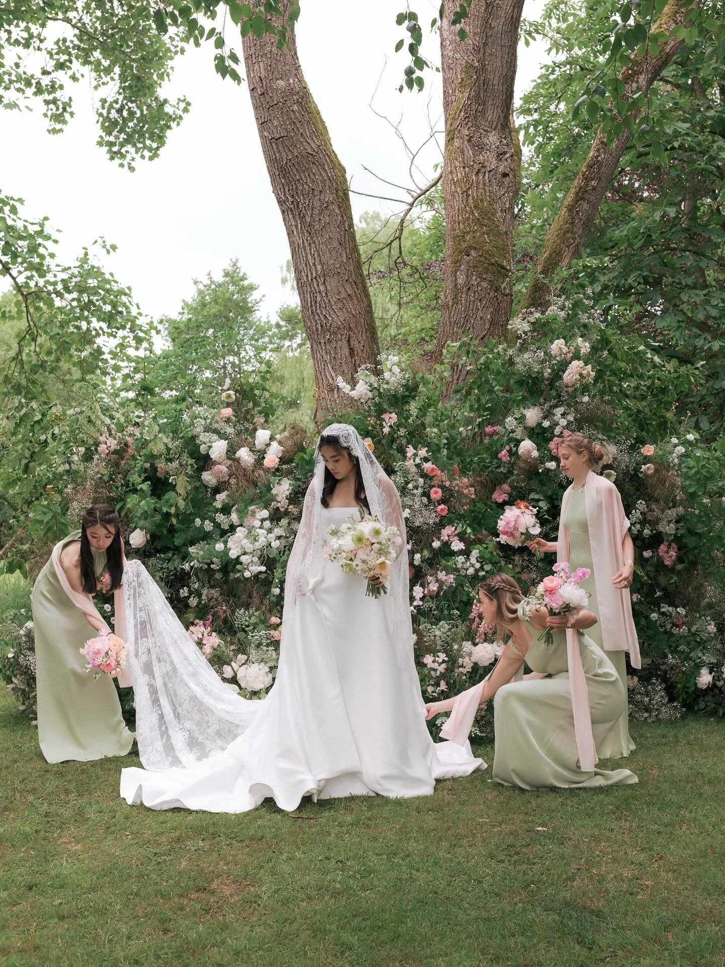 A summer&rsquo;s dream. Angel&rsquo;s fallen cloud created by us @dewsall.court 

Beautifully photographed by @ninawernicke 

celebrant @the_full_stop_celebrant
planner @rosannalucaswatts
videographer @sobyfilms
dress @theivorybridal.kl @danahareldes