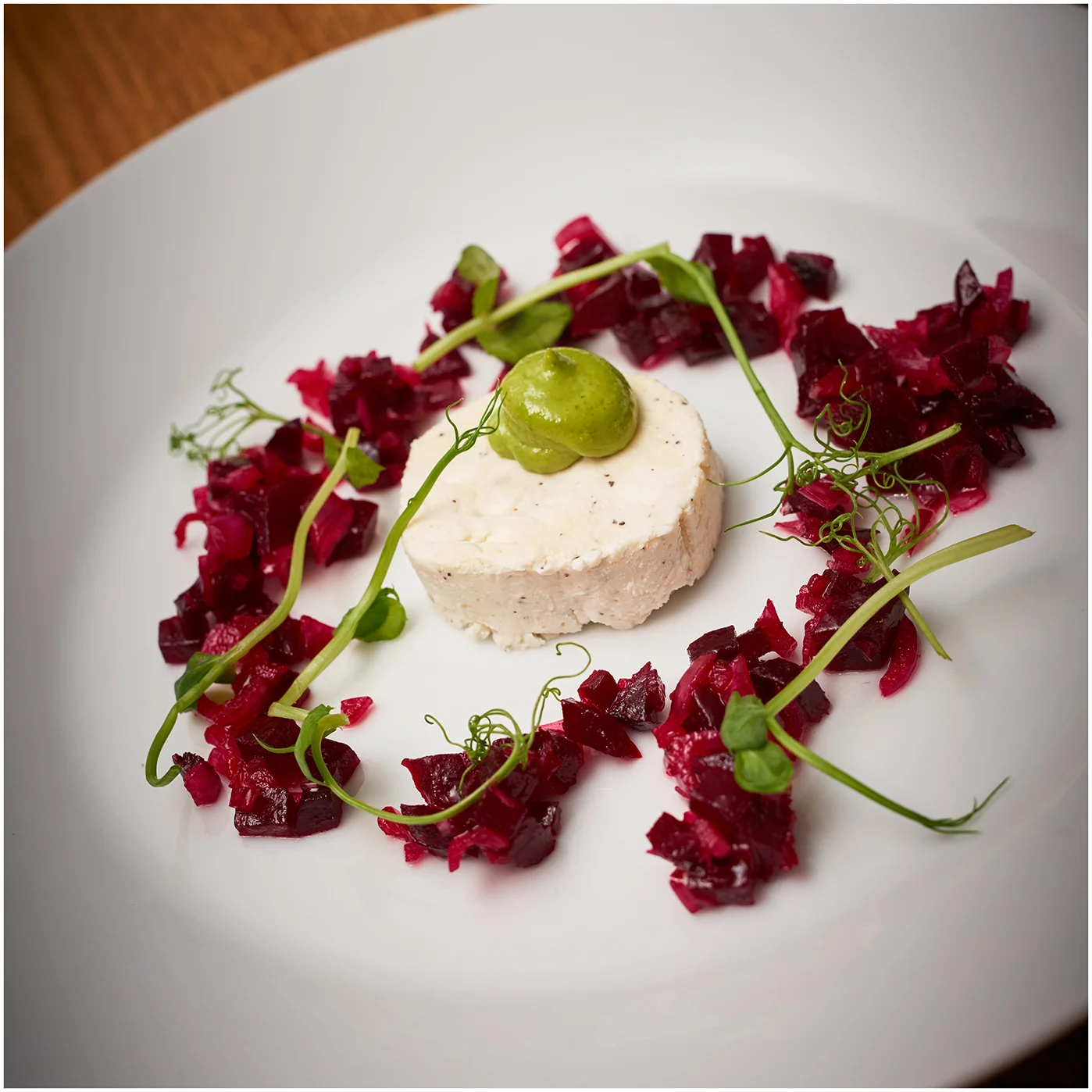 First course; goats cheese with basil mayo, beetroot and pea shoots