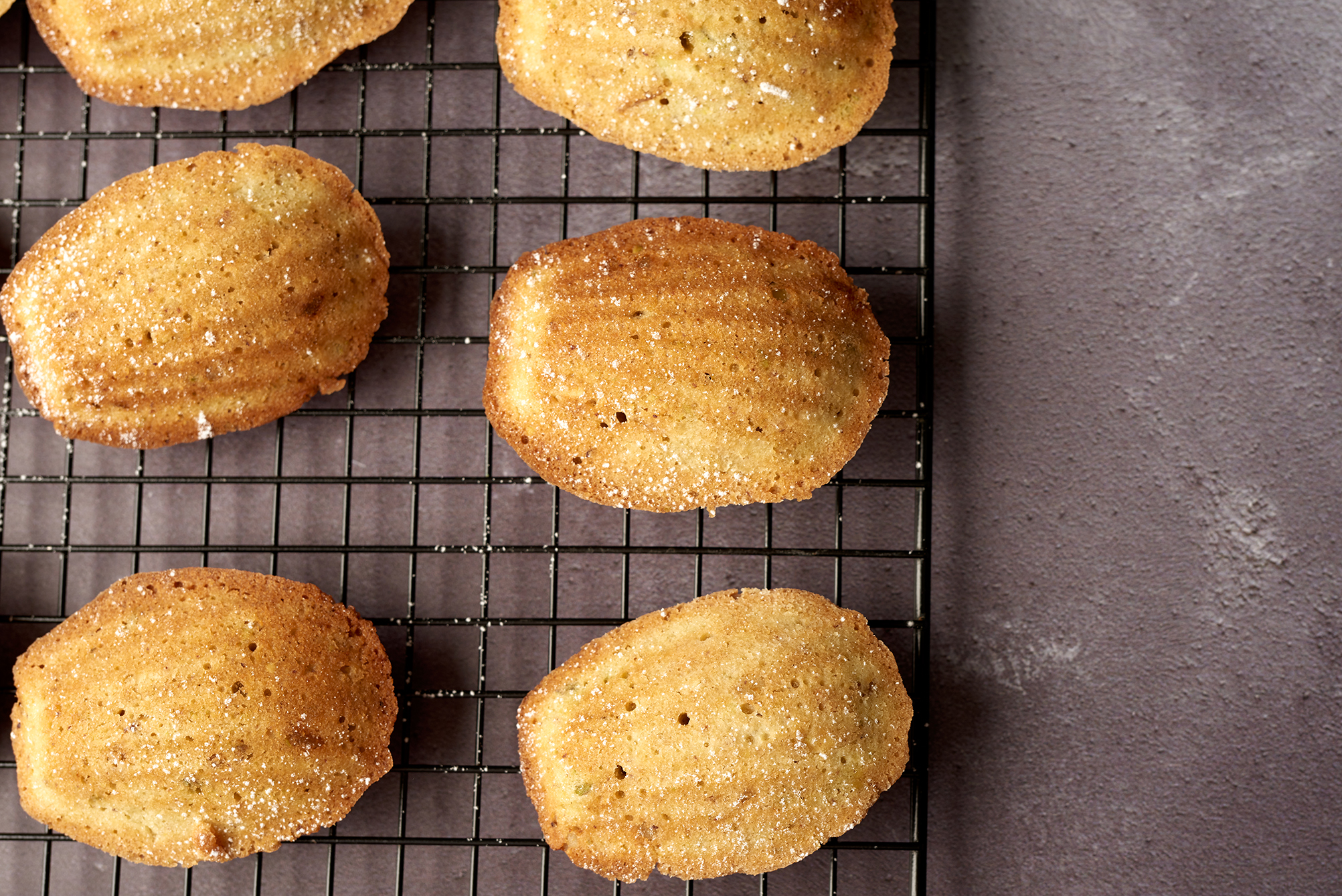 Pistachio and orange madeleines