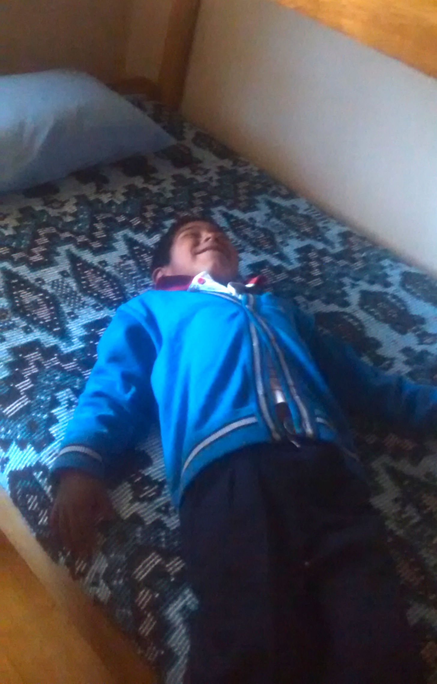 This was the first time he ever got to lay down on a bed of his own.