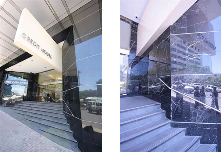 Entry Façade - Black Galaxy Granite Entry Façade - Nero Marquina Marble Feature Fin - Travertine Ceramic 300 x 600mm Matt Steps and Risers - Black Pearl 900 x 300 x 30mm Exfoliated with Stainless Steel 316 inserts