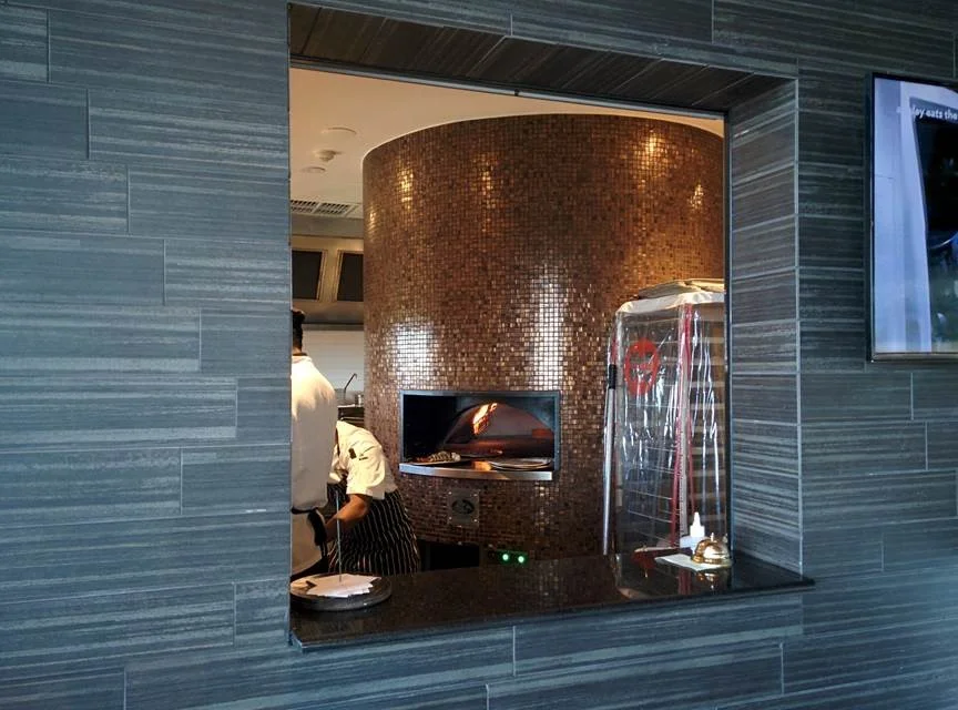 Pizza Oven - CT19 Glass Mosaic 20 x 20mm, Bronze. Internal Core & External Wall Tile - CT10 Linear cut to 100 x 600mm, Charcoal.