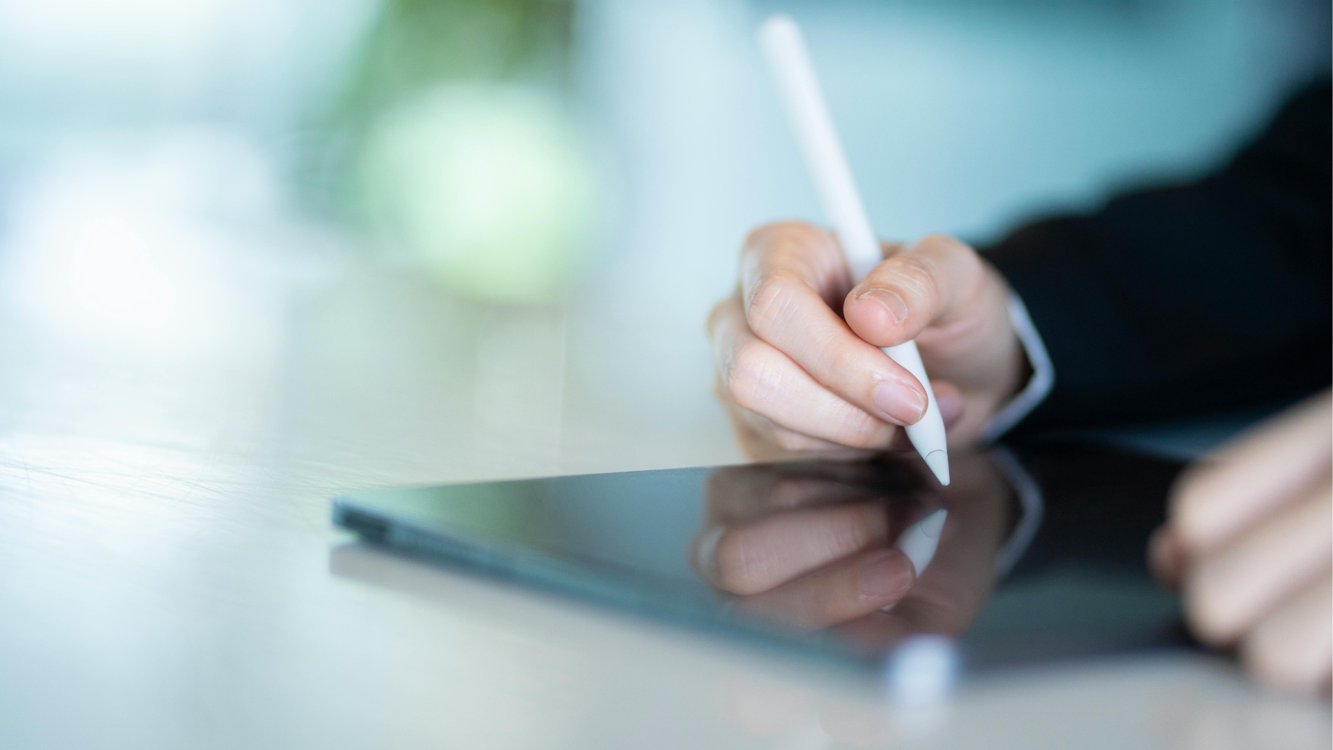 Client approving a resume writing package on a tablet