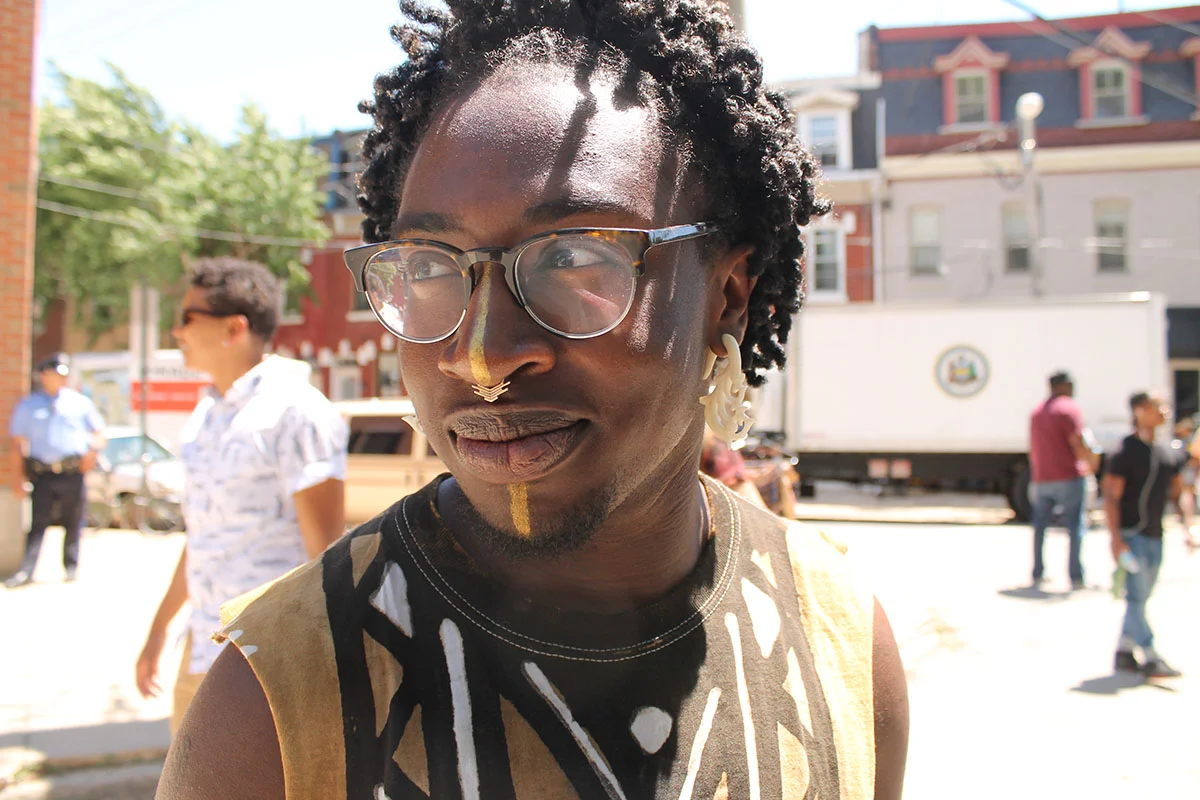 “There’s so much love, good music and so many black people.” says Kavindu Ade, 25, at the Odunde Festival on South Street in Philadelphia, Pa. on Sunday June 12, 2016. Photography by Sofiya Ballin.