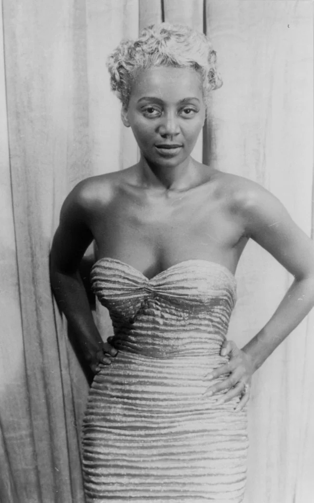 Joyce Bryant wearing a signature look from Zelda Valdes
