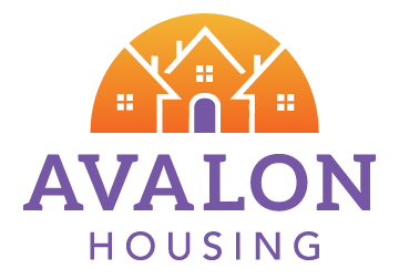Image is logo. In purple in center it reads, "Avalon Housing." Above is a row of three houses in orange shaped like a half sun. The center house has a purple door.