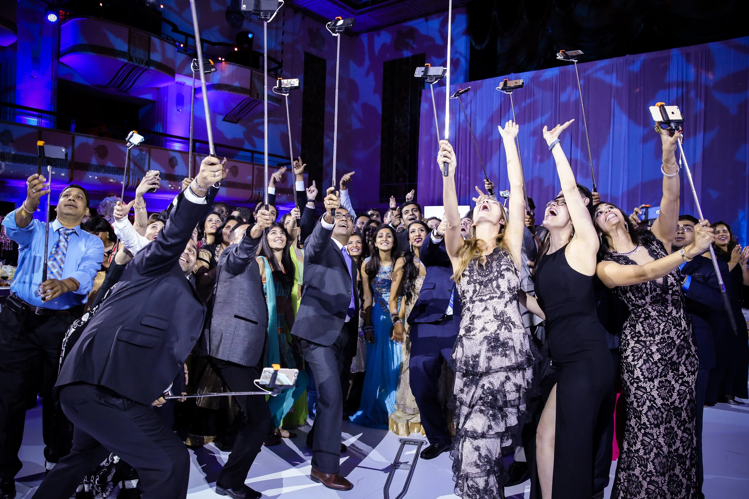 Guests with Selfie Sticks