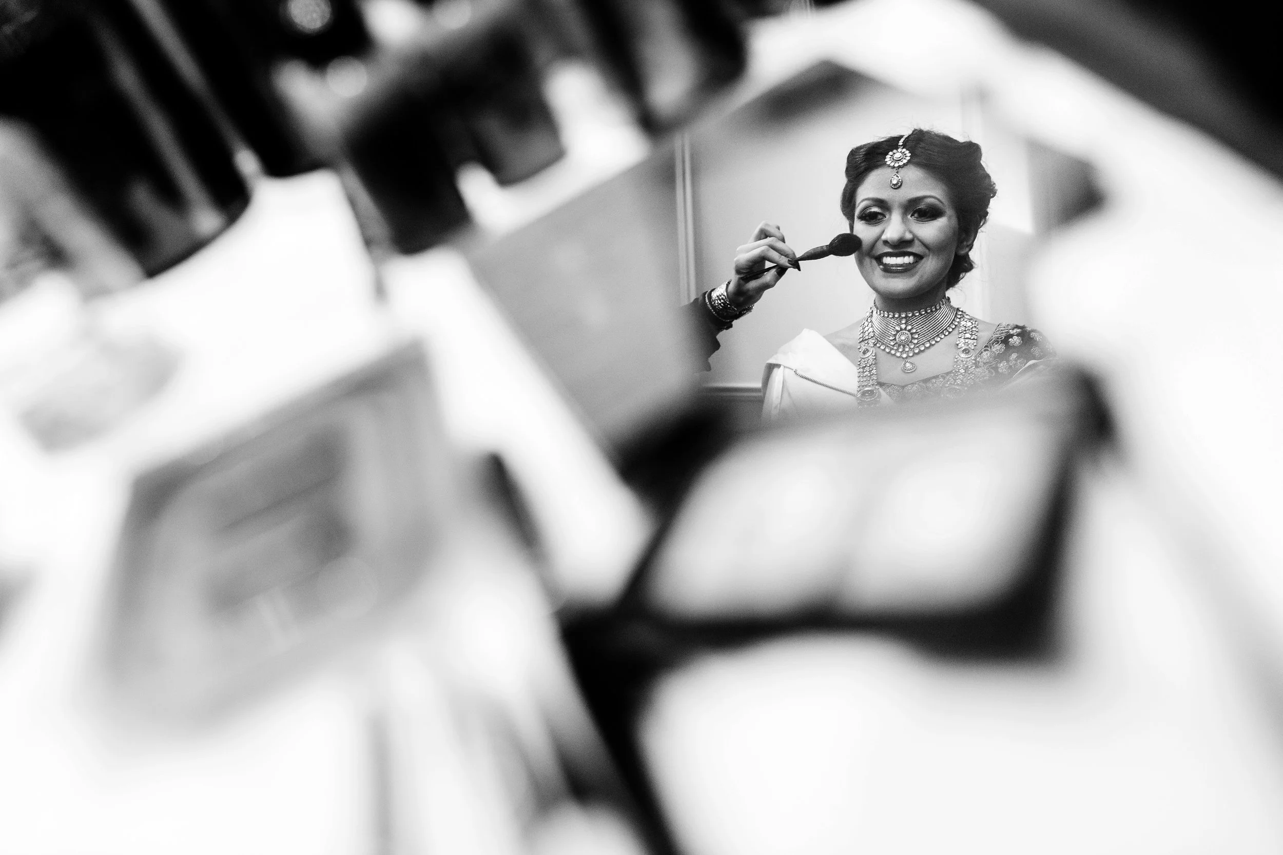 SMILING INDIAN BRIDE GETTING READY FOR WEDDING CEREMONY.JPG