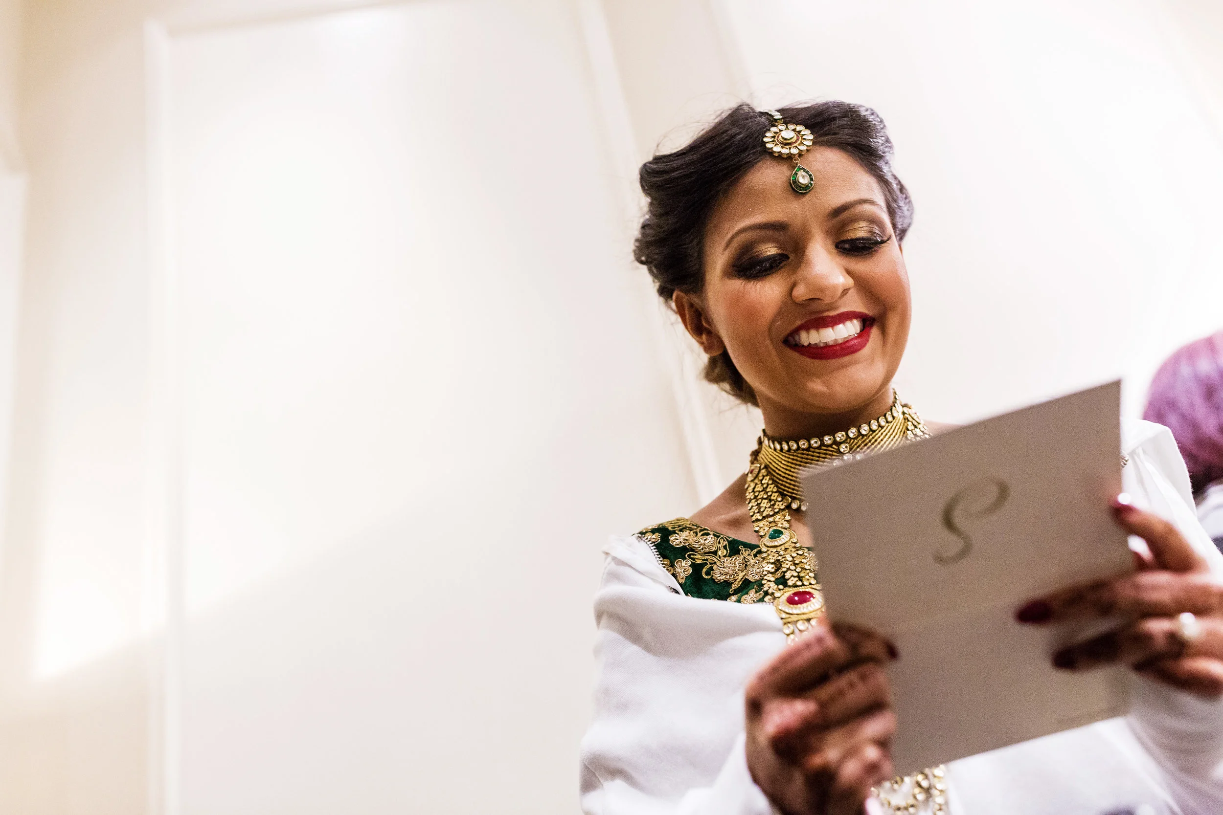 SMILING INDIAN BRIDE WITH LETTER FROM GROOM.JPG