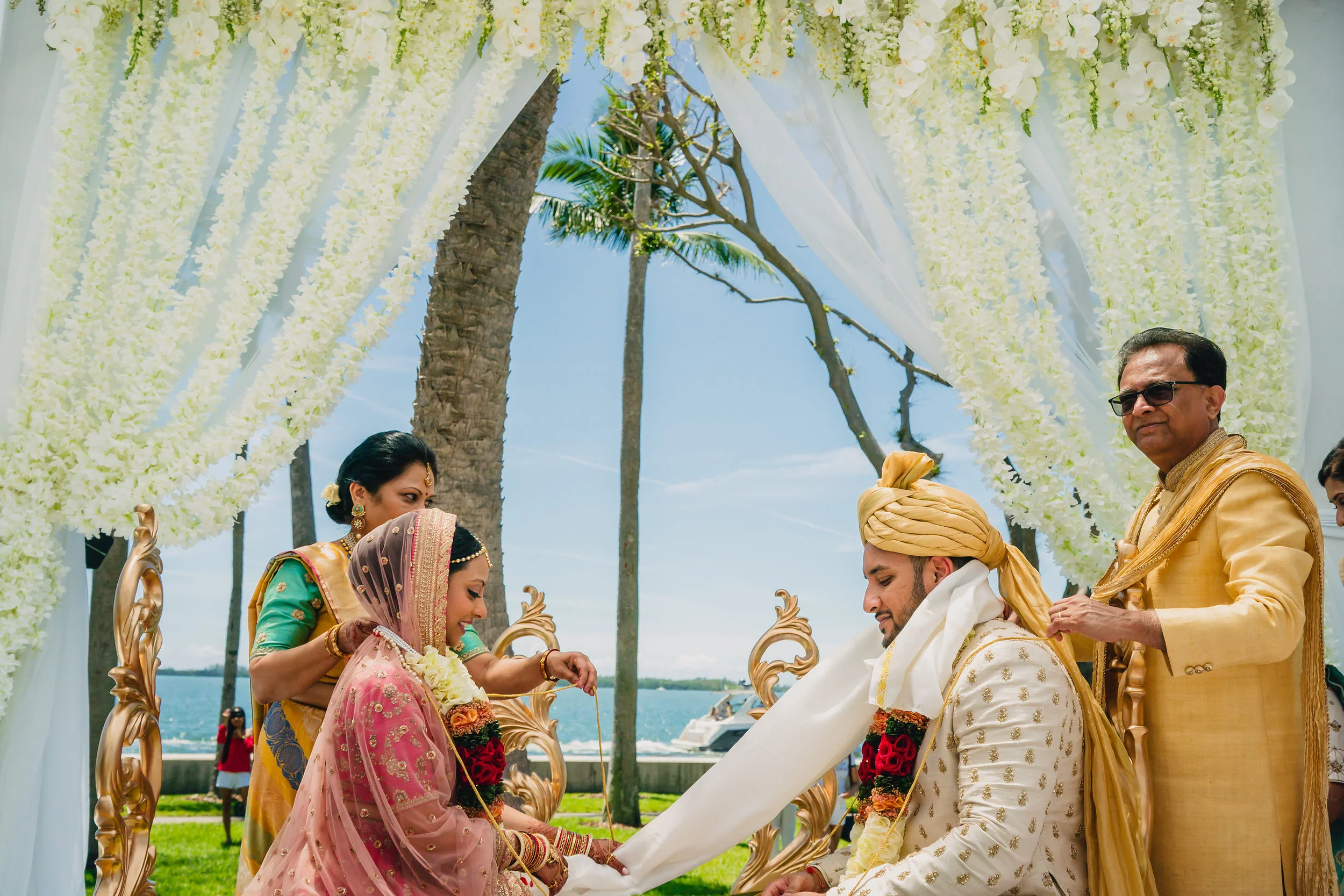 INDIAN WEDDING BRIDE AND GROOM ON ALTER2.JPG