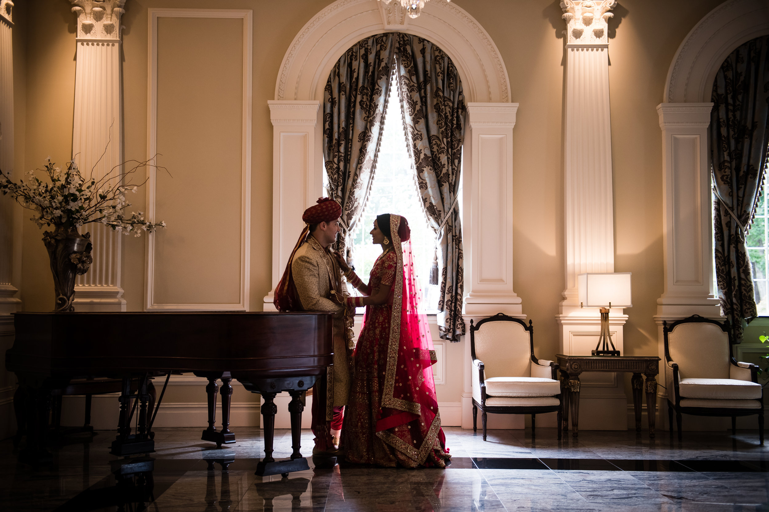 INDIAN WEDDING BRIDE AND GROOM ON PIANO.jpg