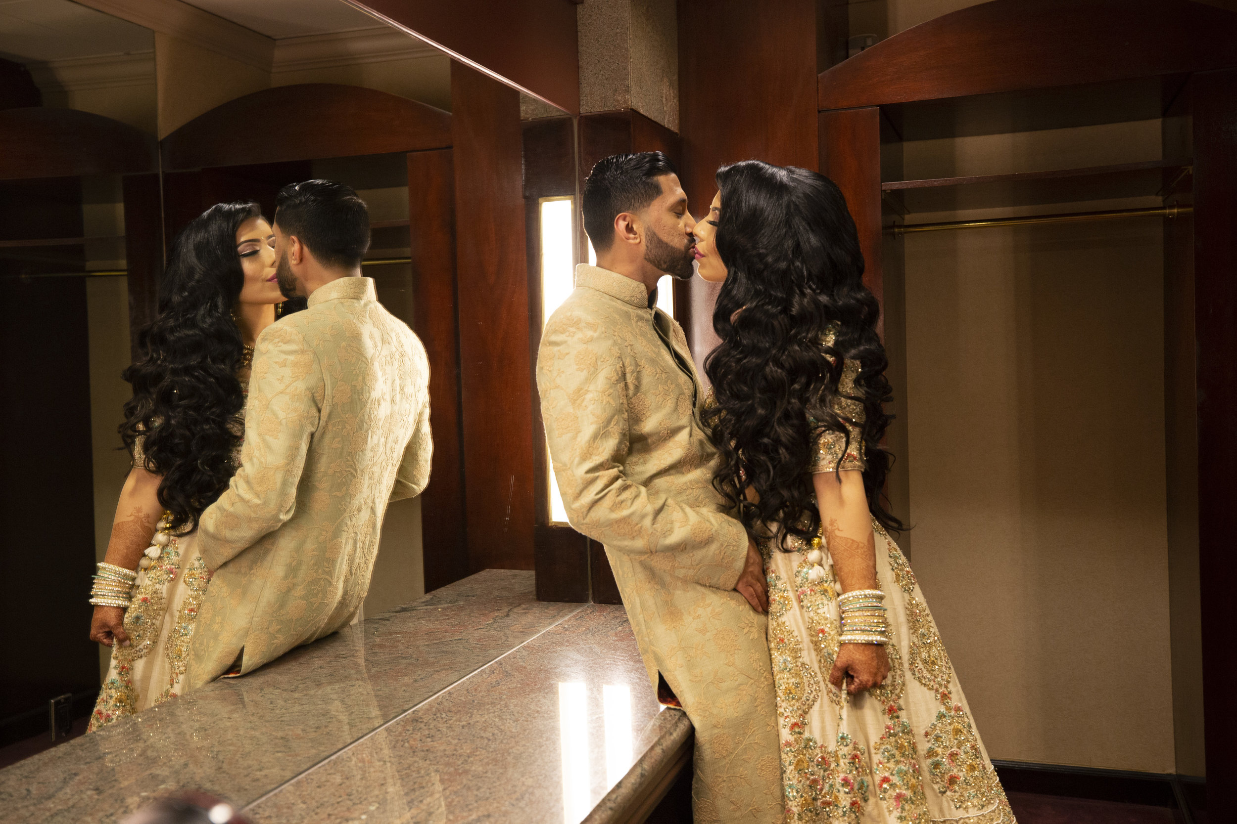 INDIAN WEDDING BRIDE AND GROOM KISS.JPG