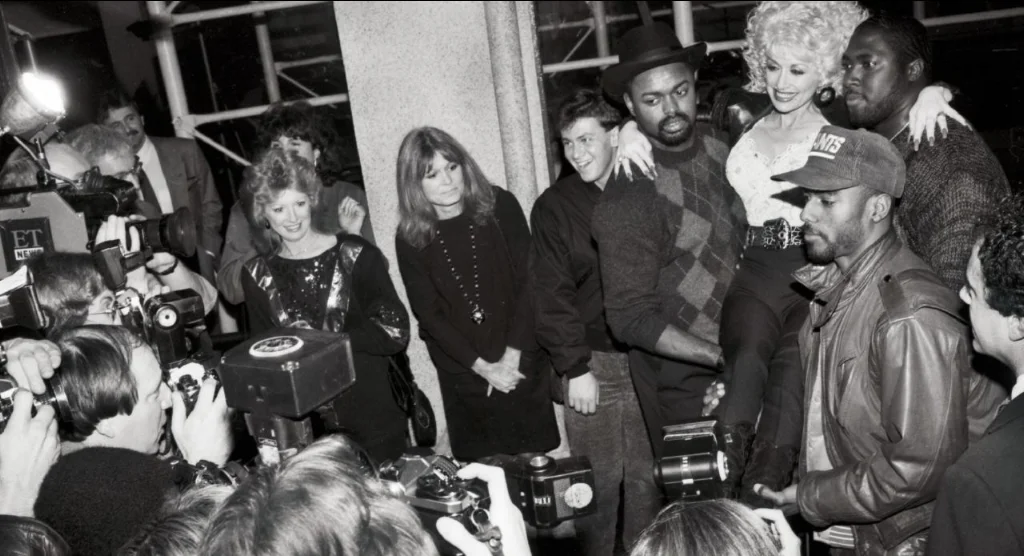 Dolly Parton with The NY Giants and Gloria Steinem
