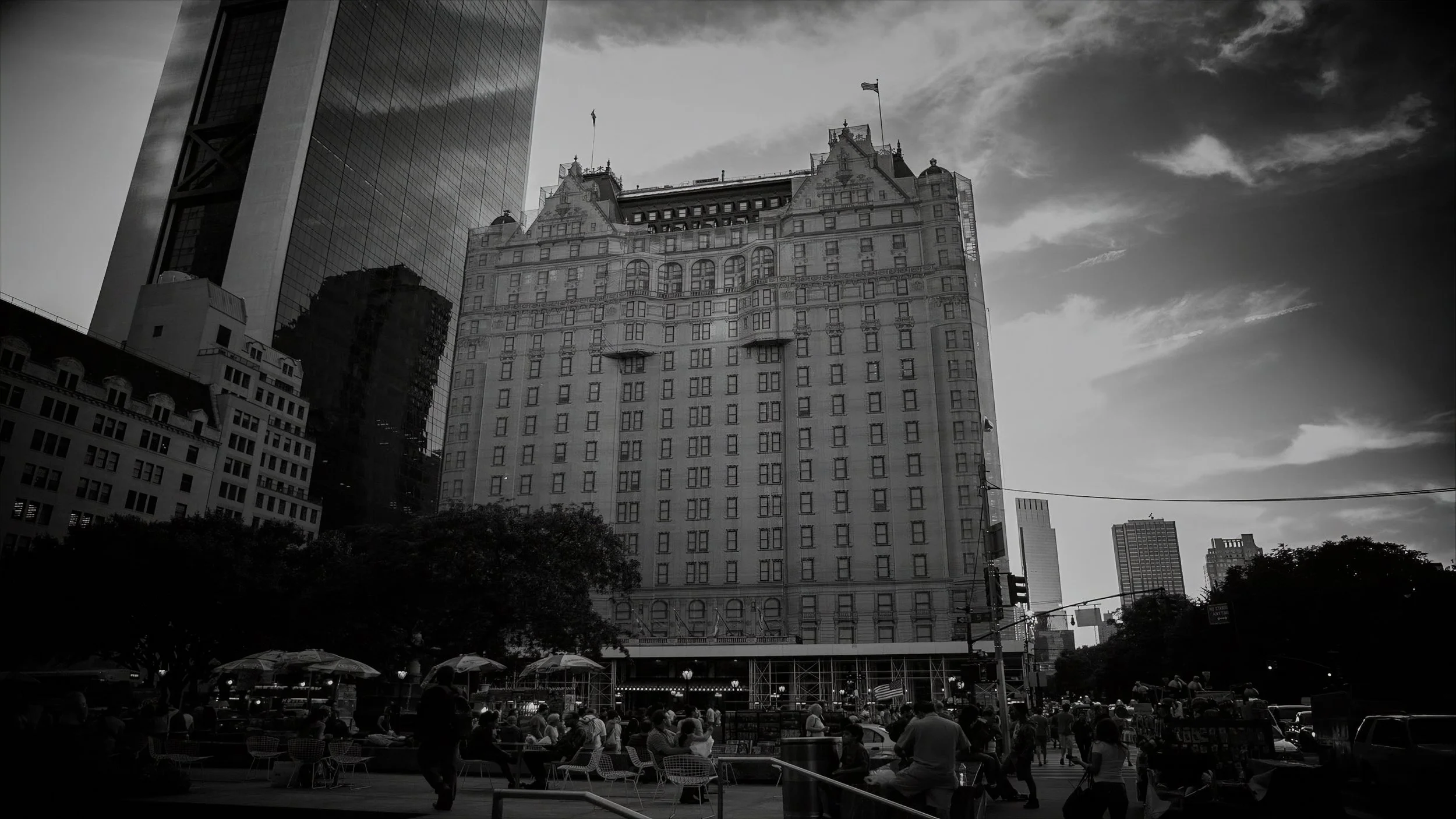 The Plaza Hotel overlooking Grand Army Plaza in New York City photographed in black and white.