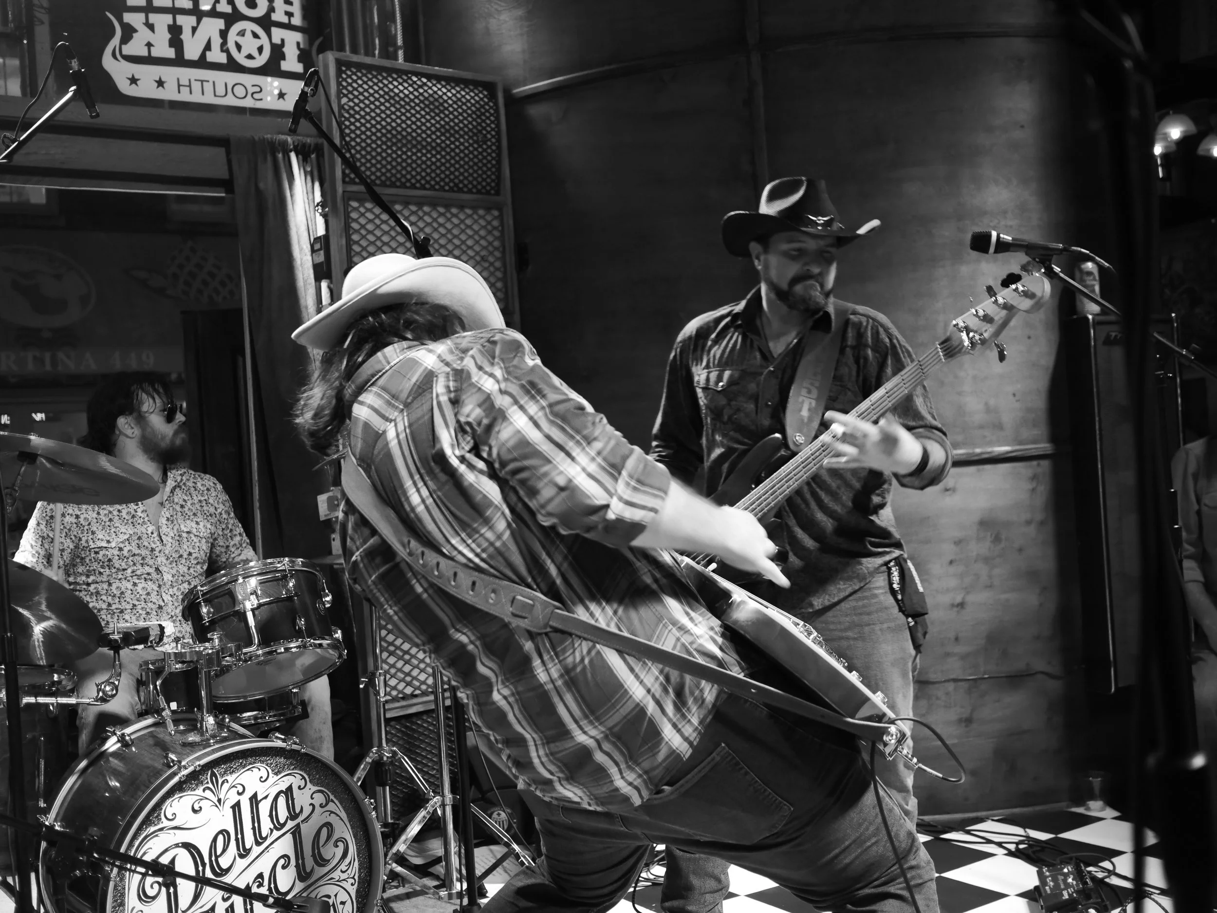 Delta Circle performing together in black and white at Honky Tonk South in Savannah.
