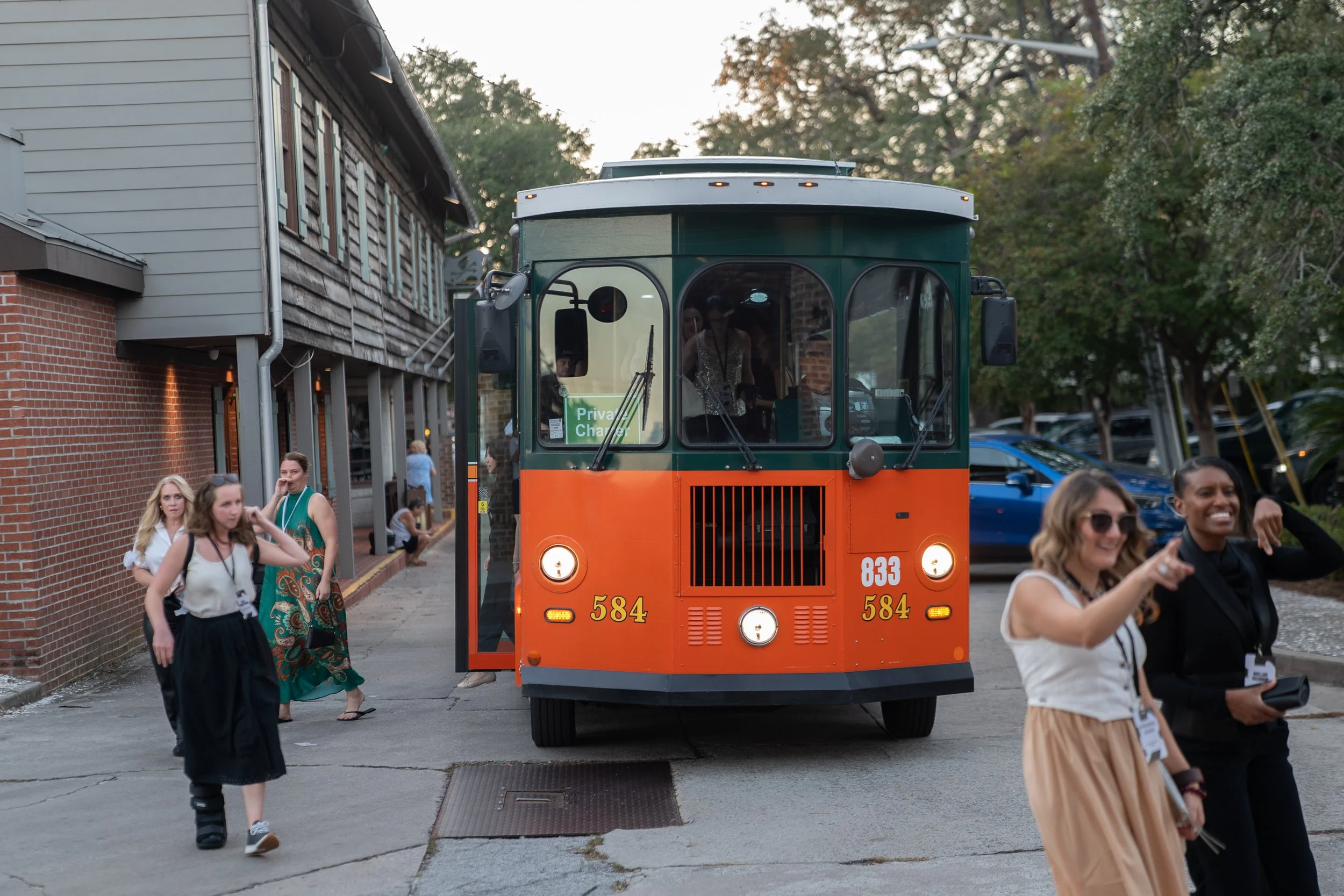 Guests arriving by trolley at Trustees' Garden in Savannah.