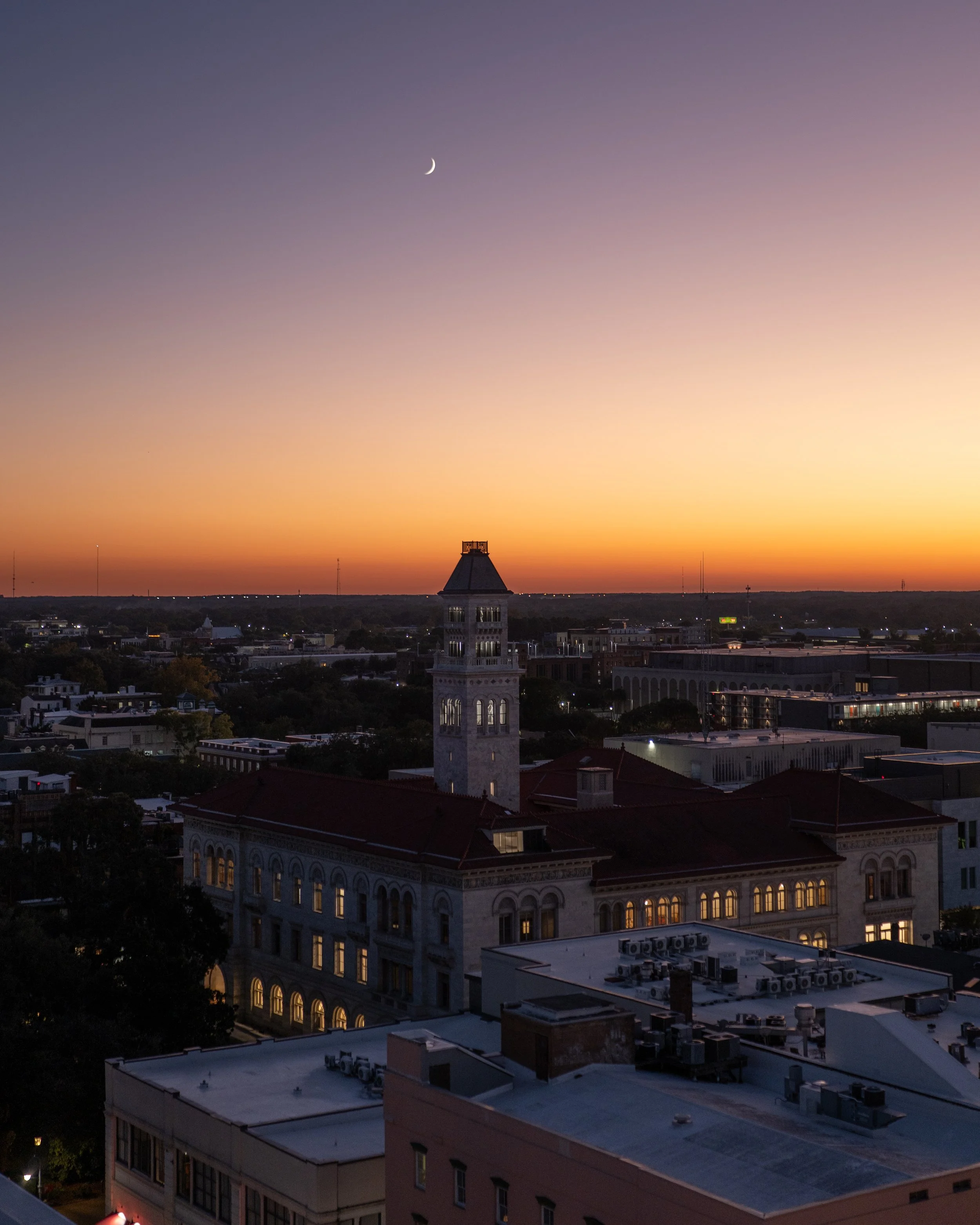 Savannah skyline beneath the evening sky during Stay and Gather.