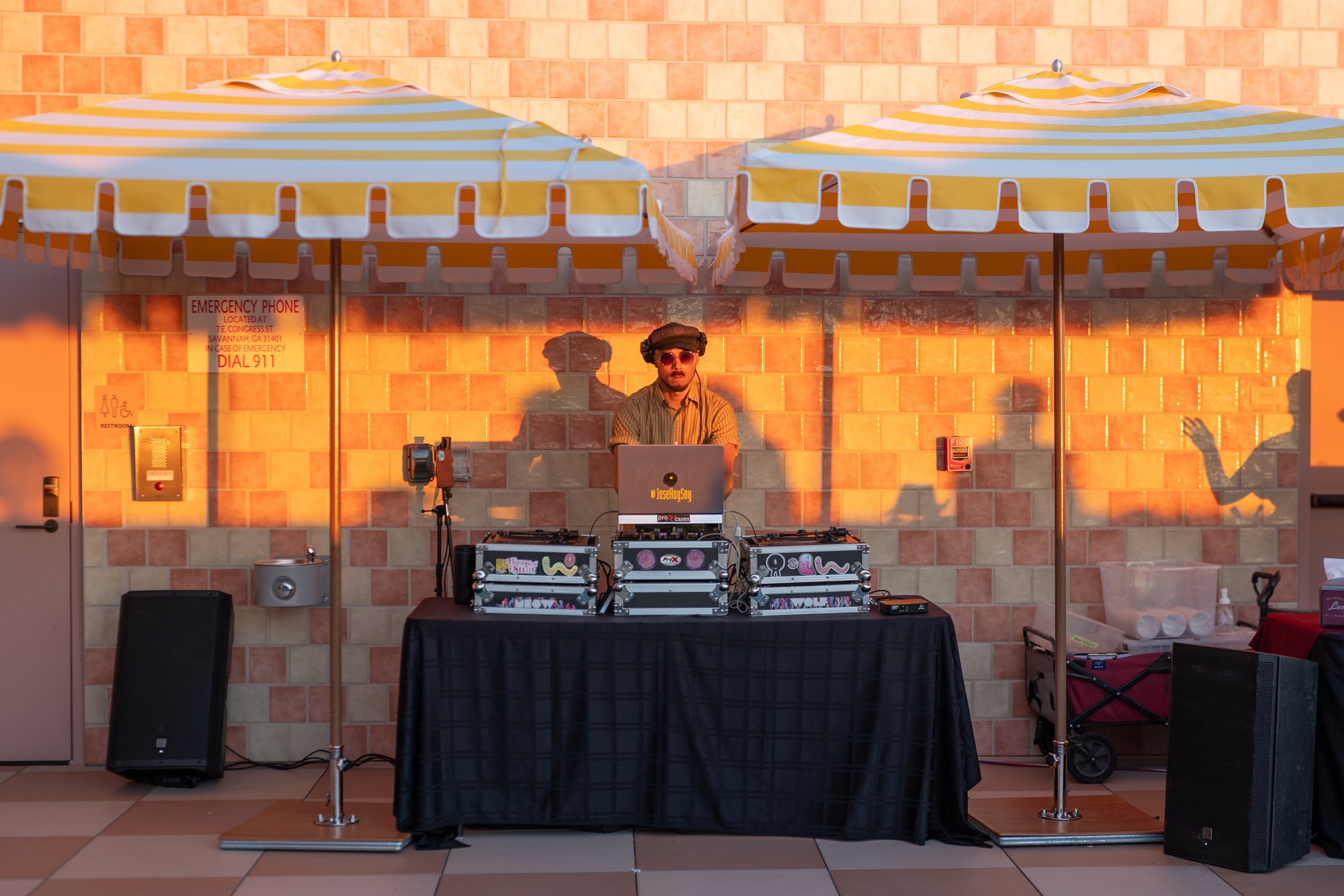 DJ performing at the Stay and Gather rooftop celebration