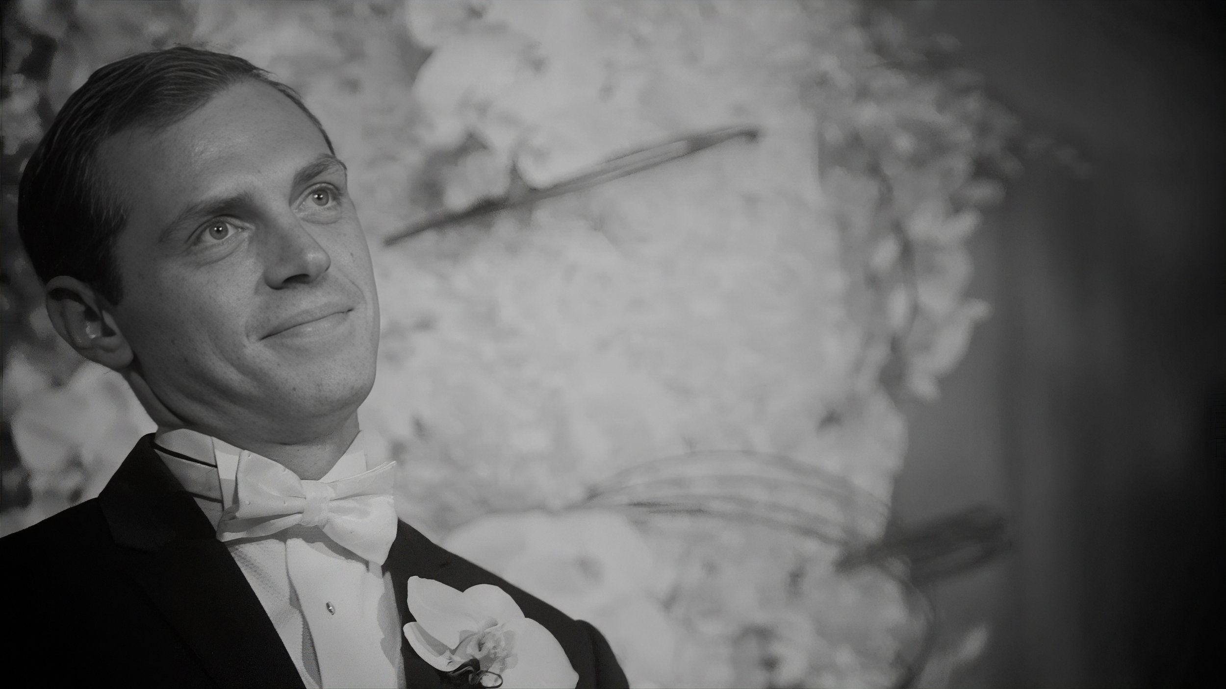 Groom reacts as he sees the bride during their wedding ceremony at The Plaza Hotel in New York.