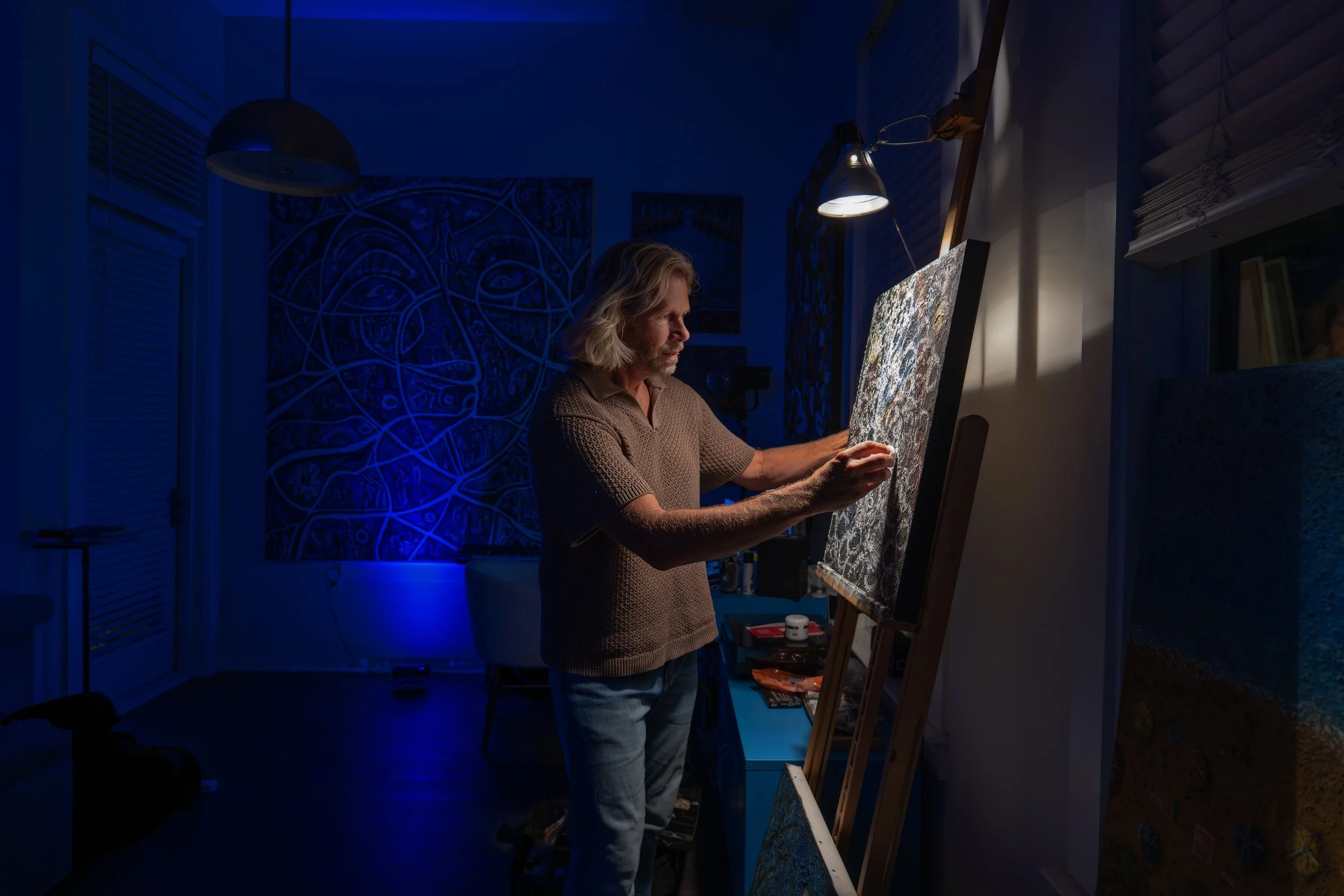 Artist Charles Maring painting in his Savannah studio, reflecting the curiosity, experimentation, and reinvention behind his keynote presentations.