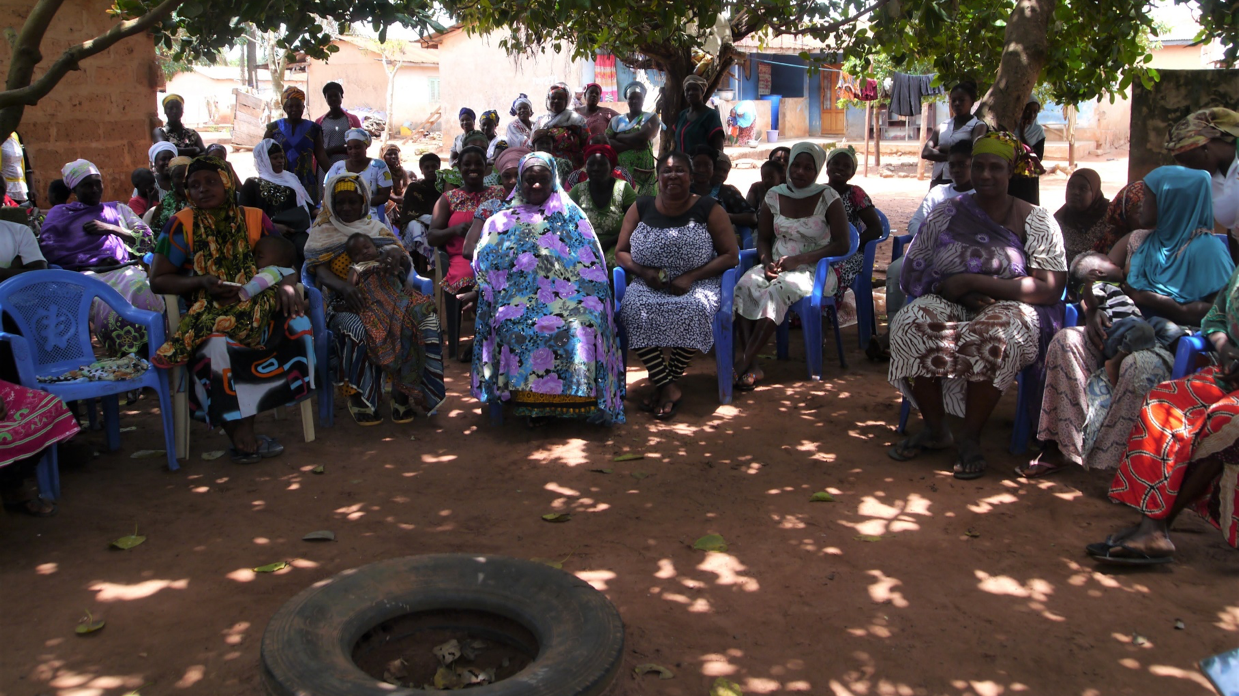 Four local Village Savings and Loans groups meet for their regular ‘sharing out’ session in Techiman North, Brong Ahafo.