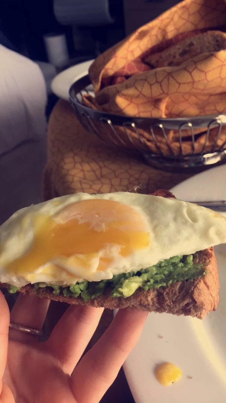 Sunny side up egg & whole wheat toast with avocado