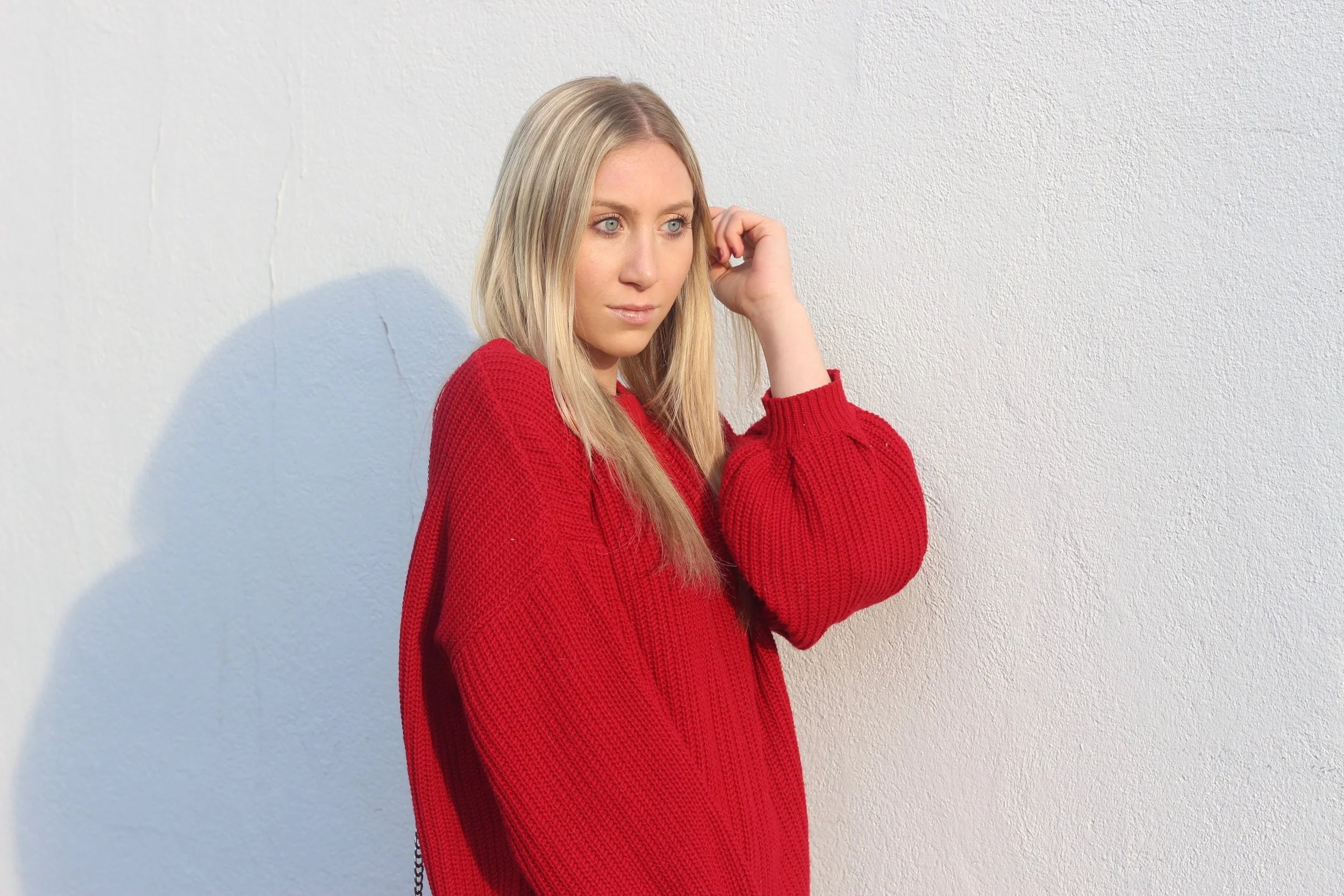 Carly of Au Courant Life in red sweater by Forever 21