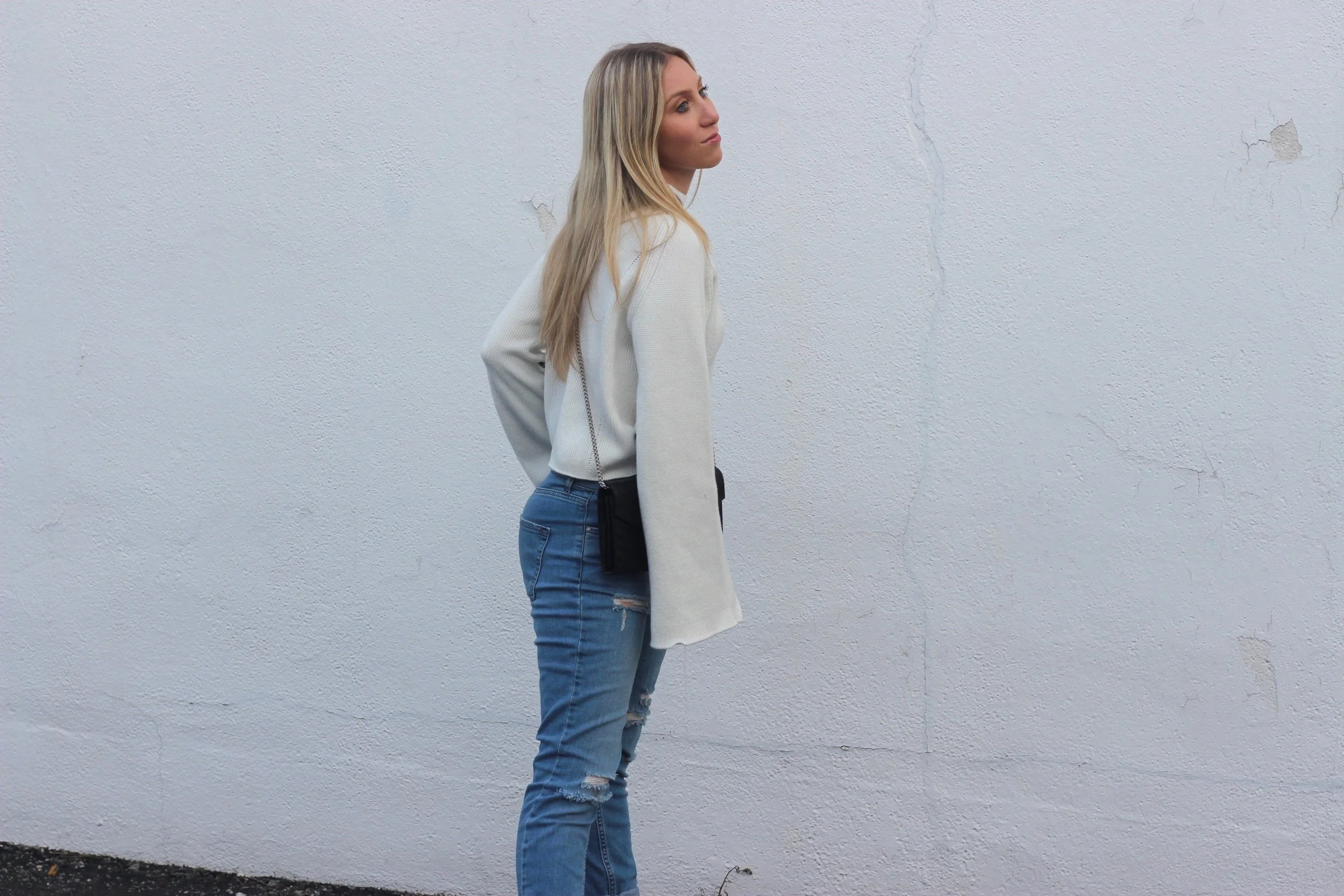 Bell sleeve sweater and boyfriend jeans by Au Courant Life