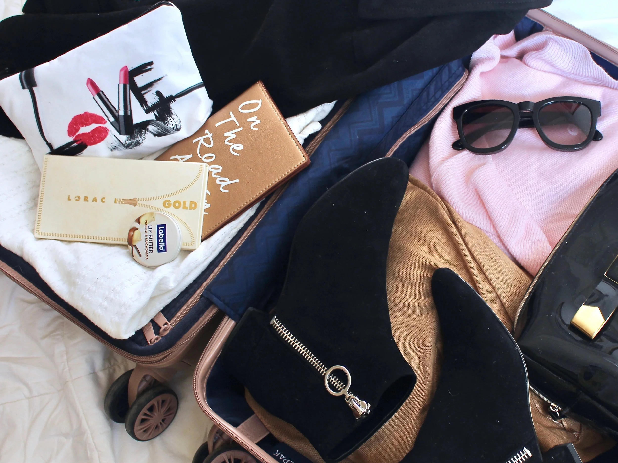 What to pack in your carry on by Au Courant Life