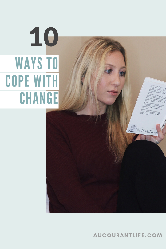girl sitting reading book cope with change by au courant life