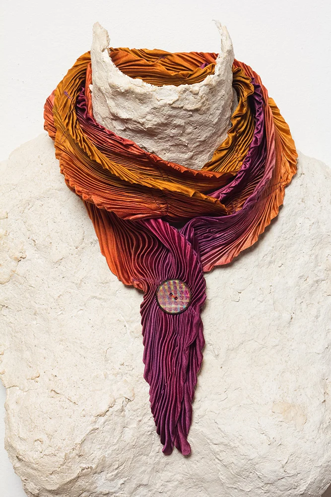 Arashi Shibori dyed silk petal scarf with a hand-painted button.