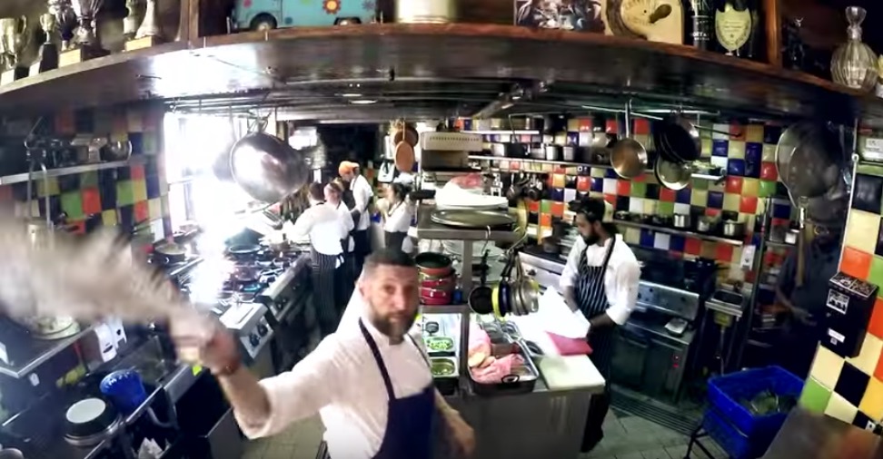 Inside the kitchen of Machneyuda restaurant. Film still from Machneyuda promotional video 